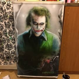Портрет Джокера на холодильнике