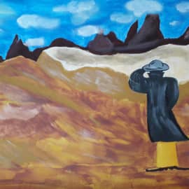 Человек в желтых штанах.В золотой пустыне.