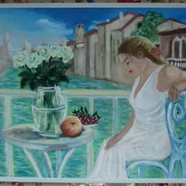 На балконе.