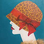 Девушка в леопардовой шляпе с красным бантом