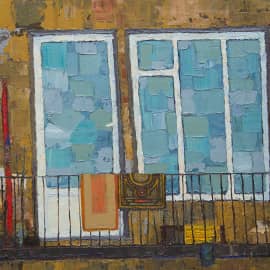 Балкон с коврами