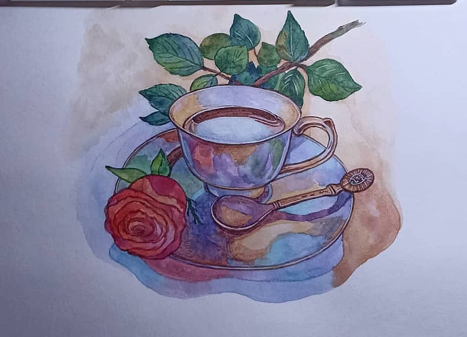 Чашка чая с розой