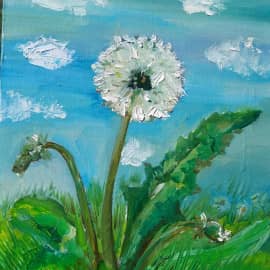 Одуванчик в поле