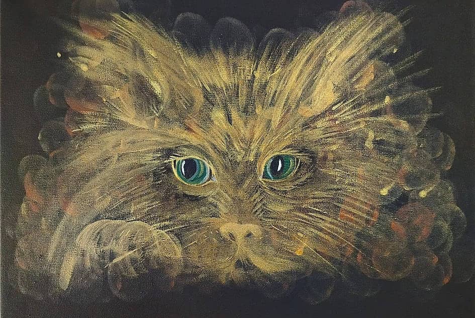 Рыжий кот с зелеными глазами