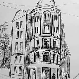 Угловое здание цилиндрической формы