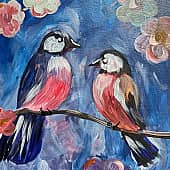 Скворцы на цветочной ветке