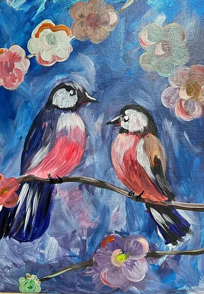 Скворцы на цветочной ветке