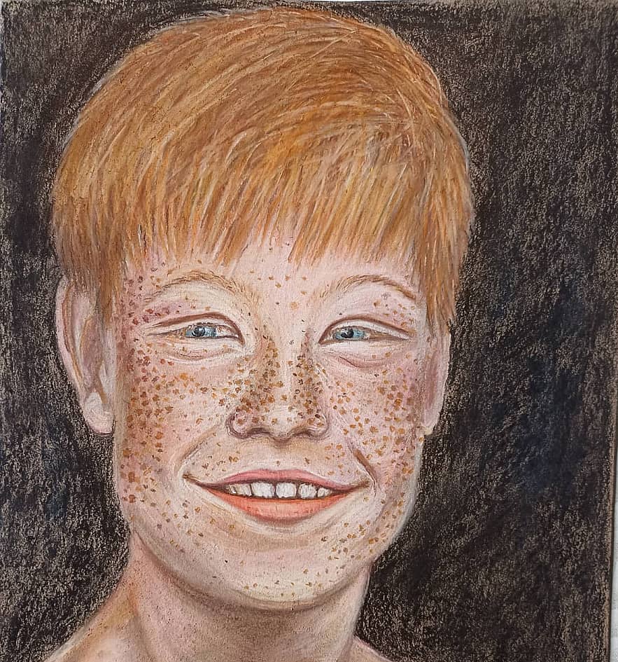 Портрет рыжеволосого мальчика