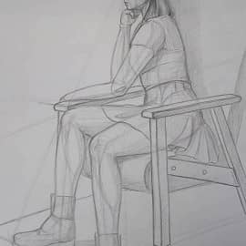 натура в кресле