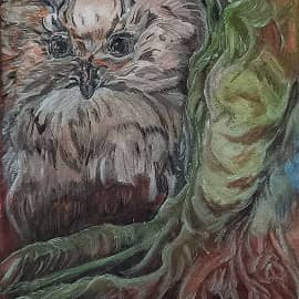 Сова-рыбачка спряталась